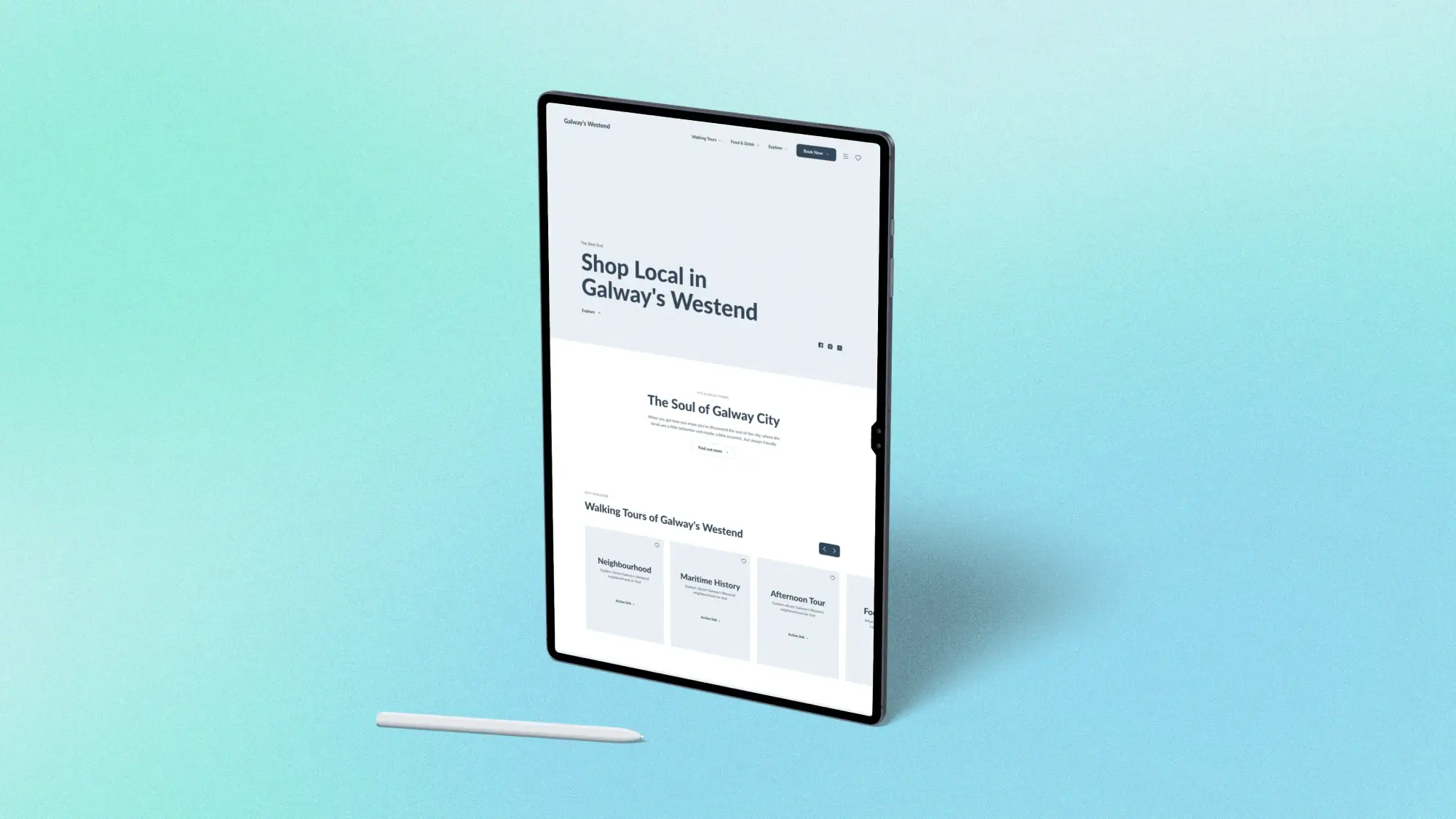 A tablet displaying a website with the headline Shop Local in Galways Westend stands upright on a light blue gradient surface, with a white stylus placed nearby—powered by Simpl by Rob&Paul.